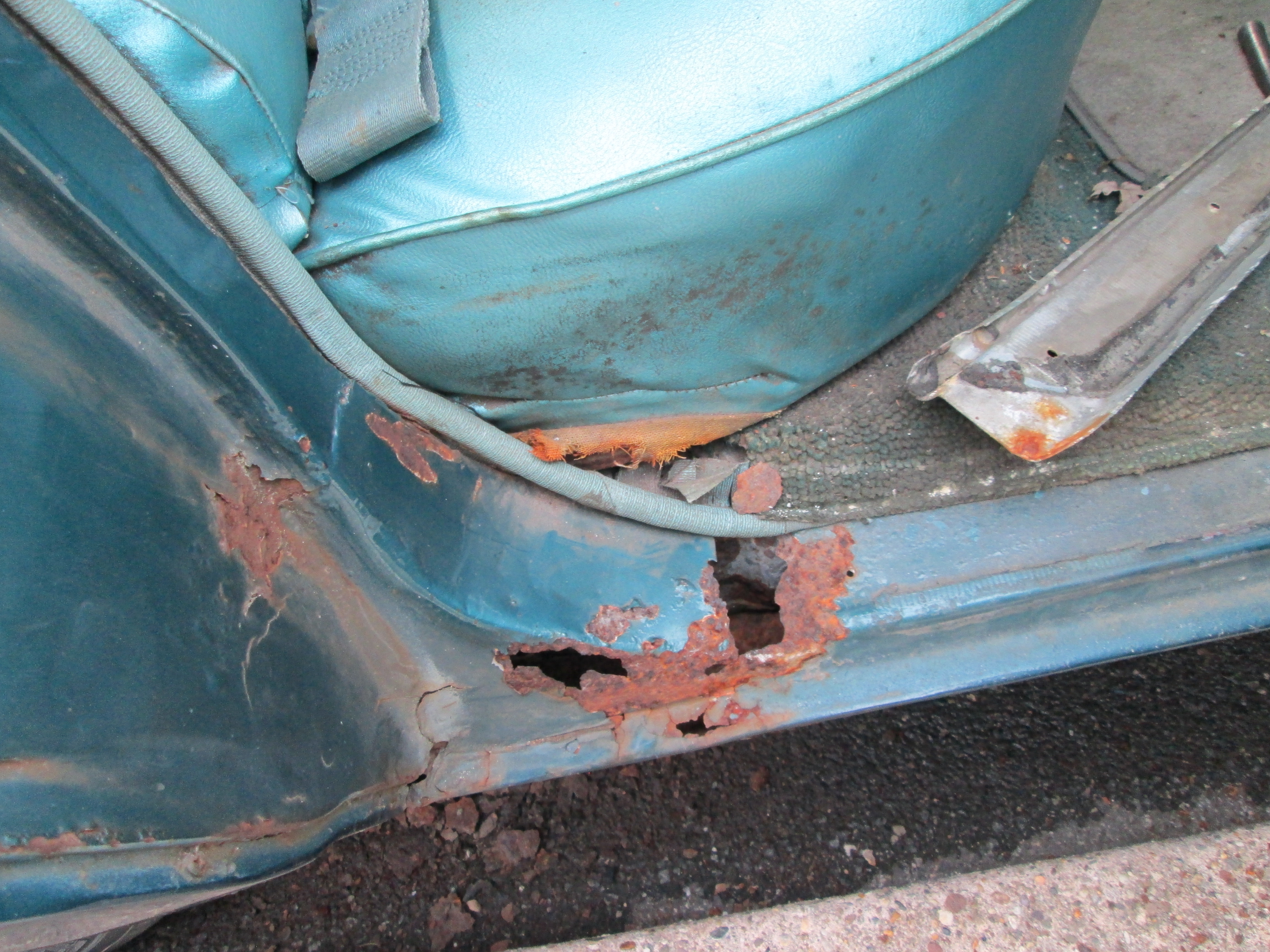 more significant rust damage on the rear right passenger door well, pulling this apart led us to find some more damage in the wheel well